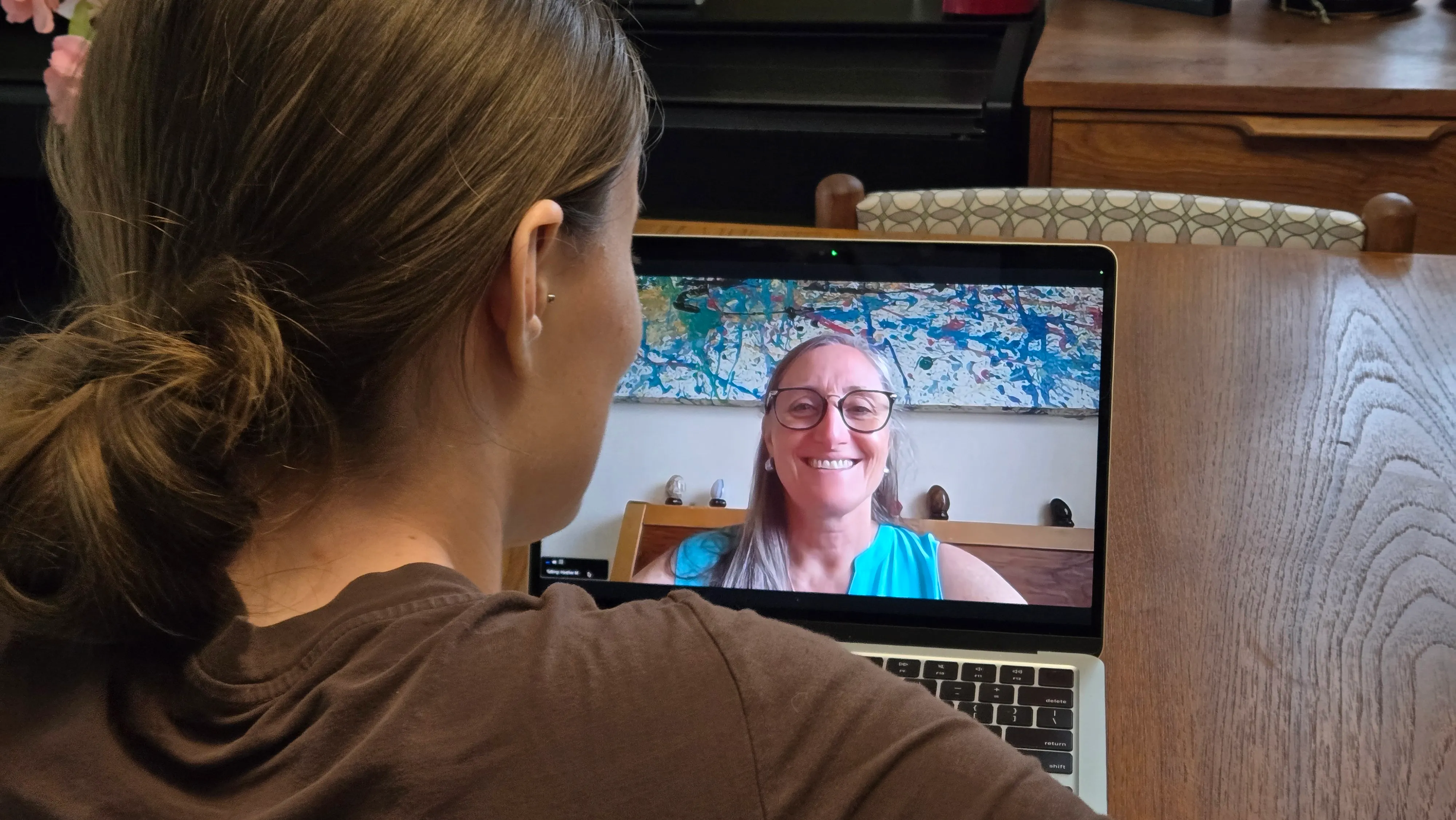 An adult client in a video therapy session